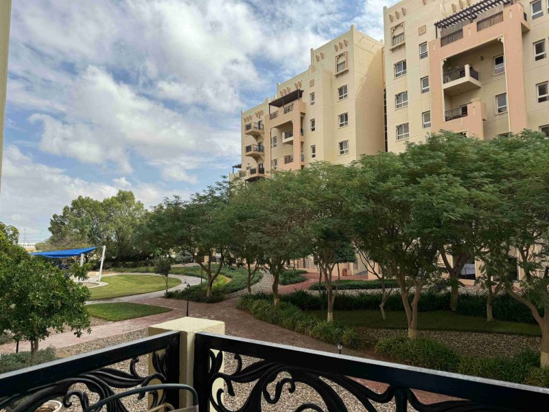 Front view of the 3BHK apartment building showing balconies