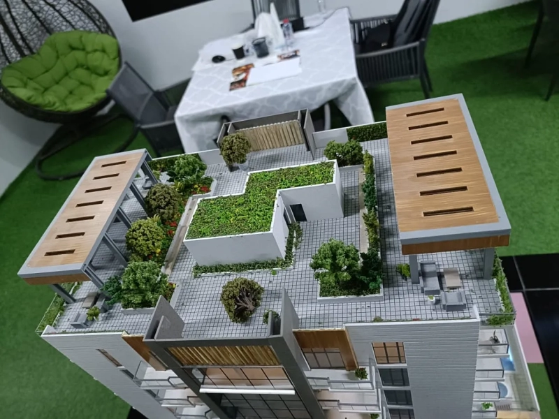 Modern 1-bedroom unit on the 13th floor in JVC, Dubai, featuring two balconies with stunning views of the community amenities